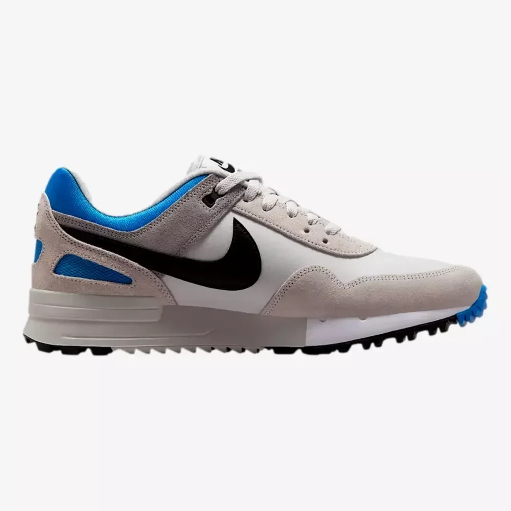 A gray and white athletic sneaker with a black swoosh logo, blue inner lining and heel detail, white laces, and a rugged black and blue outsole—get these stylish kicks now with the best deals under $50, displayed on a white background.